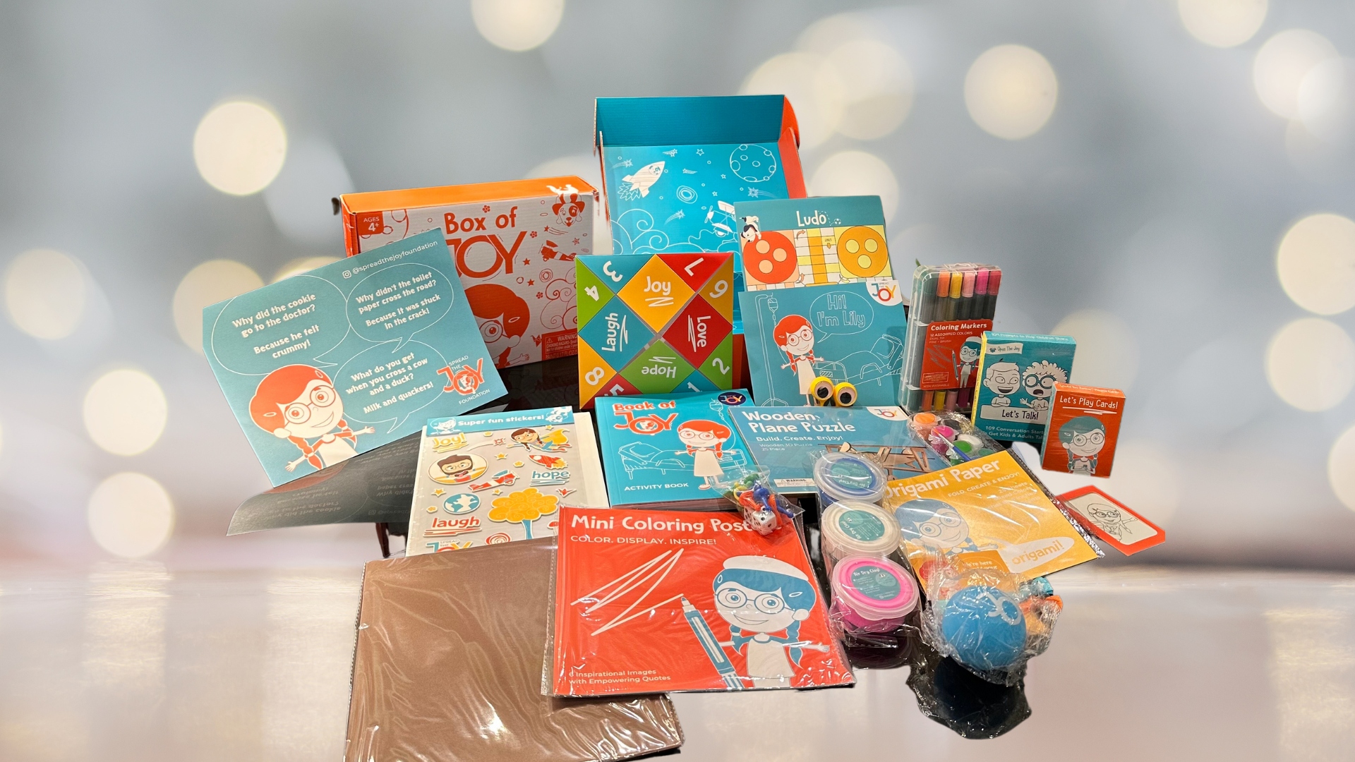 A Joy Box displayed with all of its contents